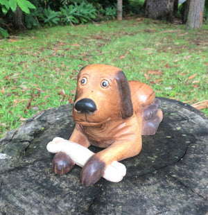 Wooden Laying Dog with a Bone