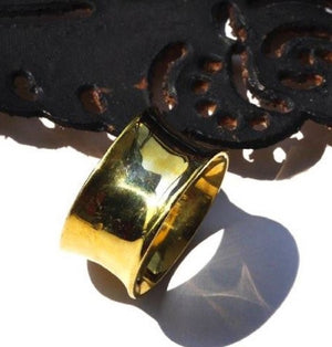 Curved Brass Ring made from Bombshells and Bullets in Cambodia