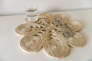 Our flower placemats are handwoven from jute to add that understated chic beach vibe to your dinner sets.  Jute placemat. Table Mat. Woven placemat. Natural flower placemat.  Neutral flower placemat. 